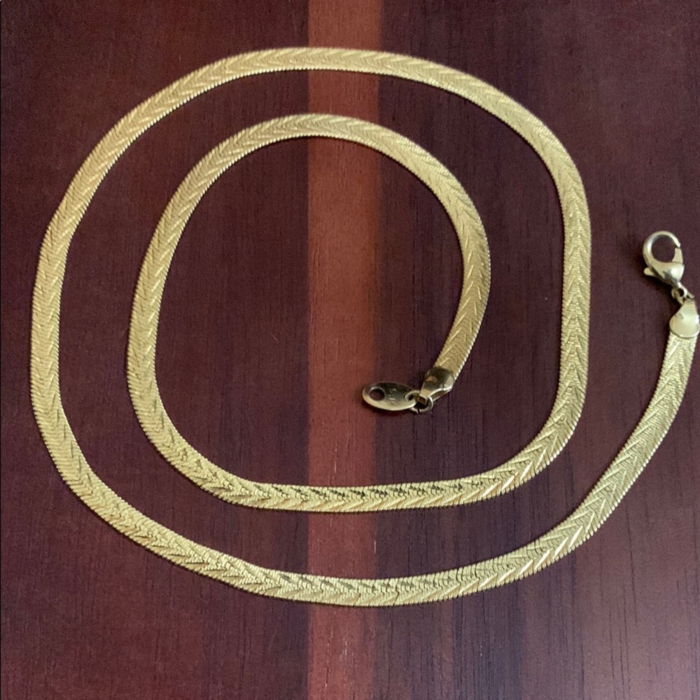 Gold tone reversible necklace